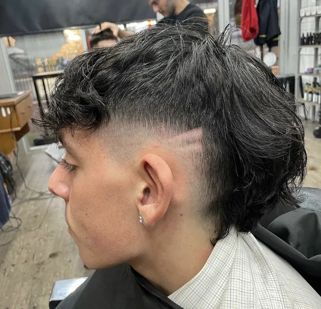 Young man getting a modern skin fade