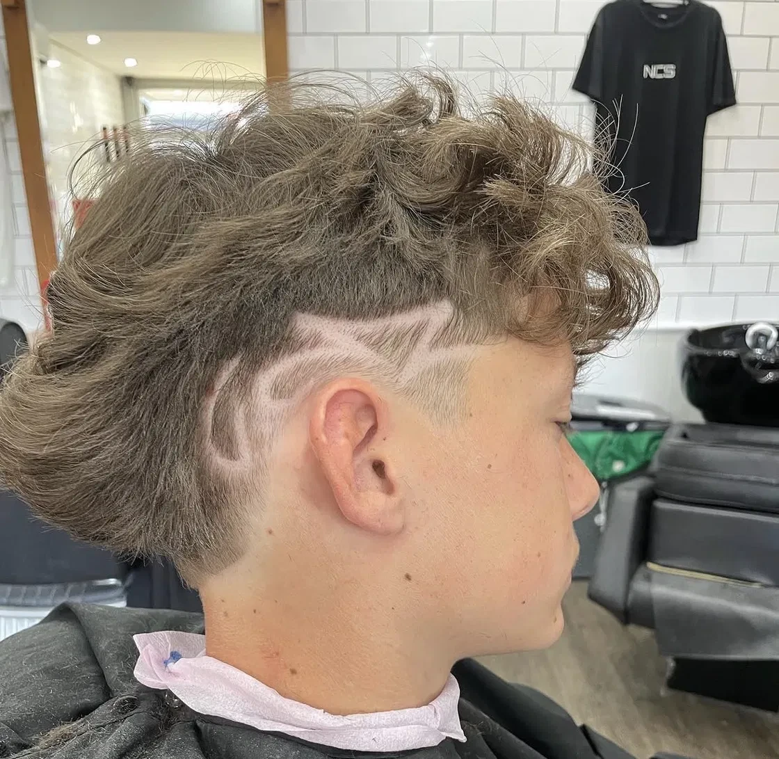 Curly mullet with freestyle design